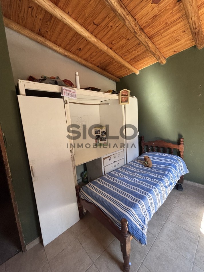 EXCELENTE PROPIEDAD EN RAMA CON DOS CASAS 