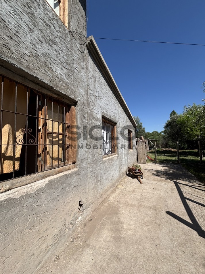 EXCELENTE PROPIEDAD EN RAMA CON DOS CASAS 