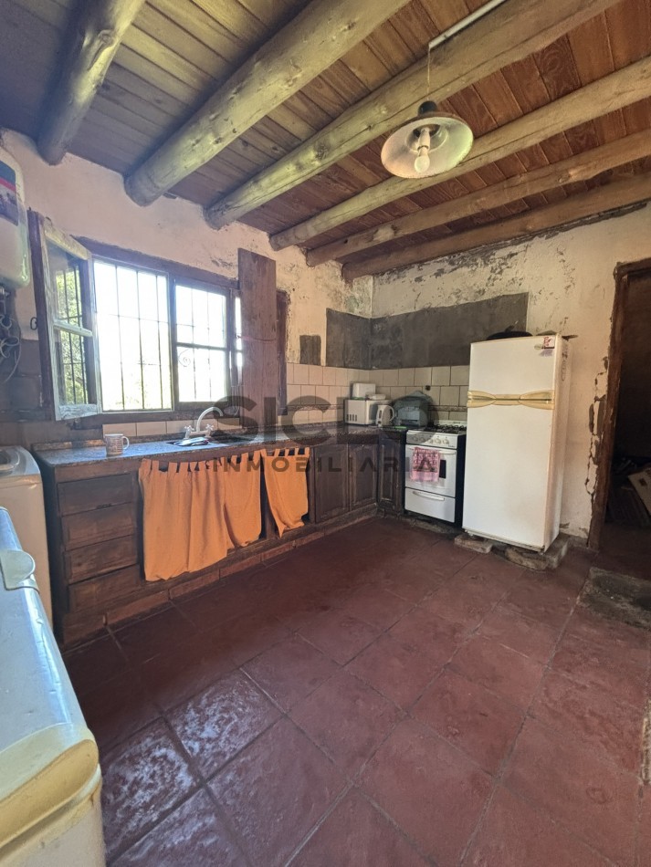 EXCELENTE PROPIEDAD EN RAMA CON DOS CASAS 