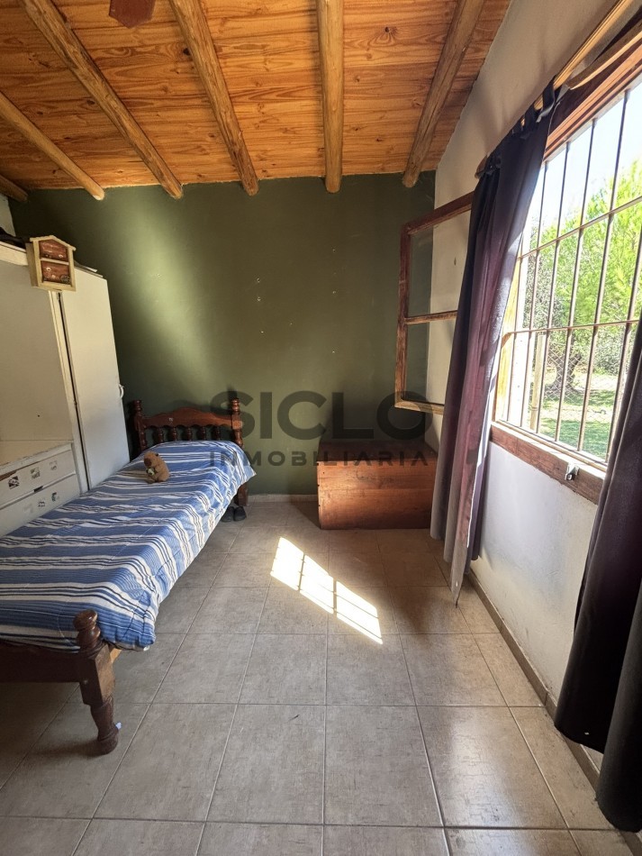 EXCELENTE PROPIEDAD EN RAMA CON DOS CASAS 