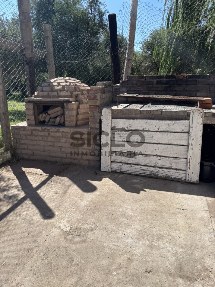 EXCELENTE PROPIEDAD EN RAMA CON DOS CASAS 