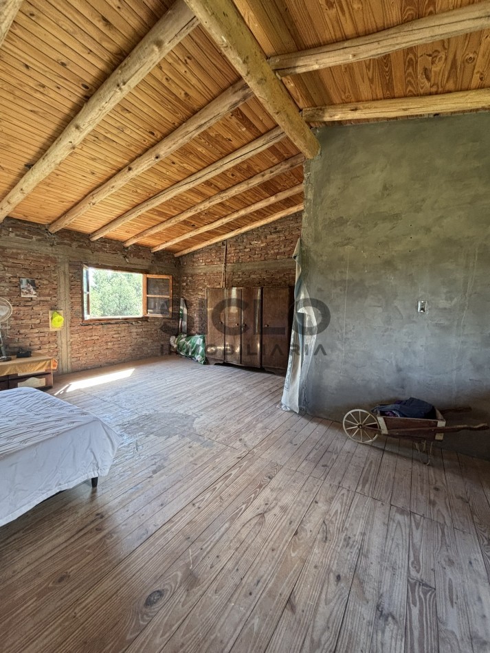 EXCELENTE PROPIEDAD EN RAMA CON DOS CASAS 